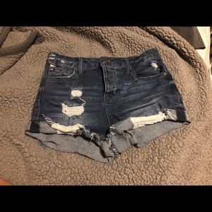 Celebrity pink distressed jean shorts